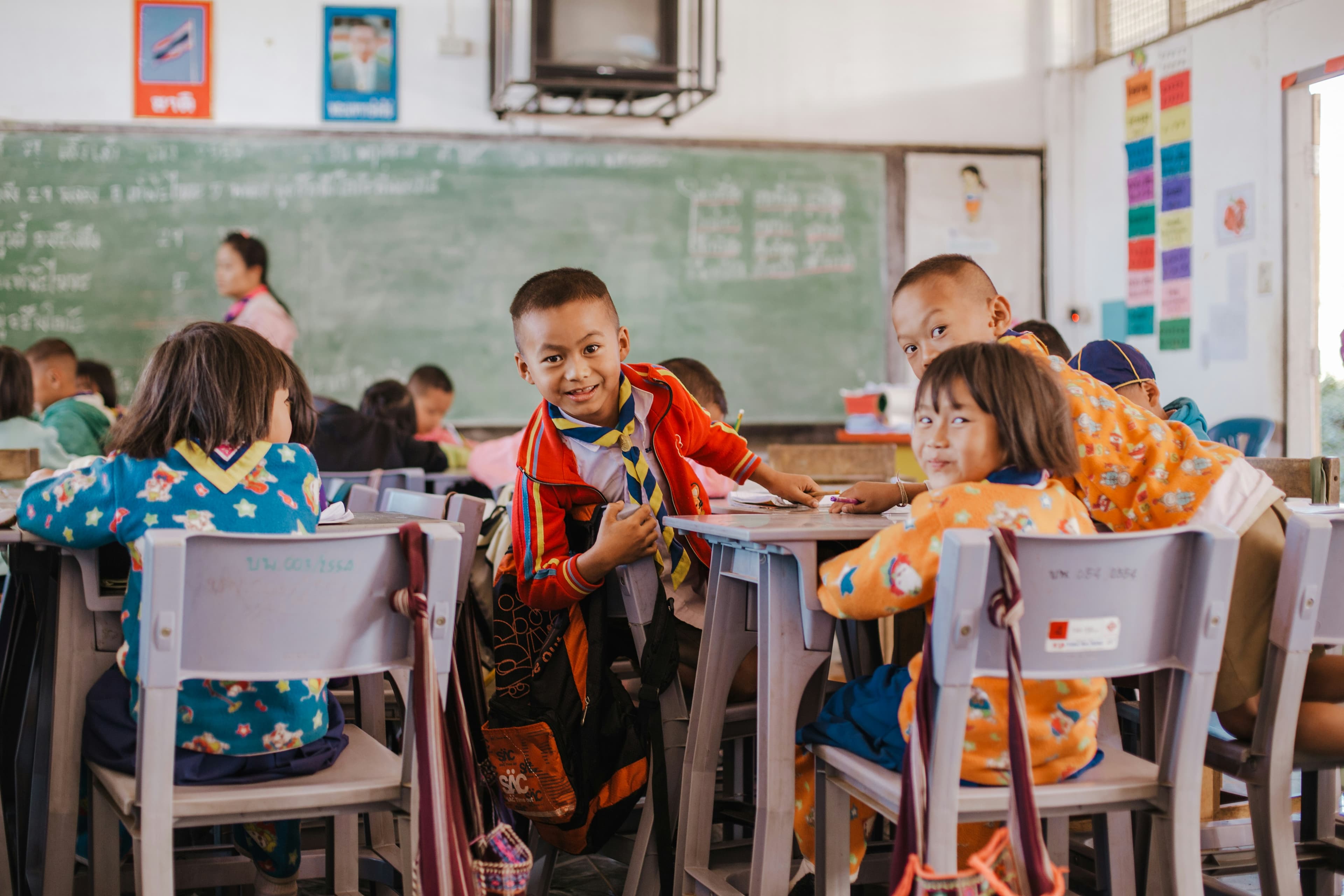 Students in a bright classroom